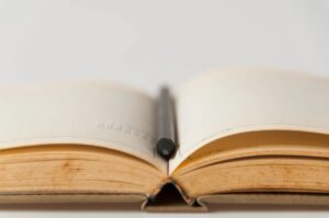 open book with pen
